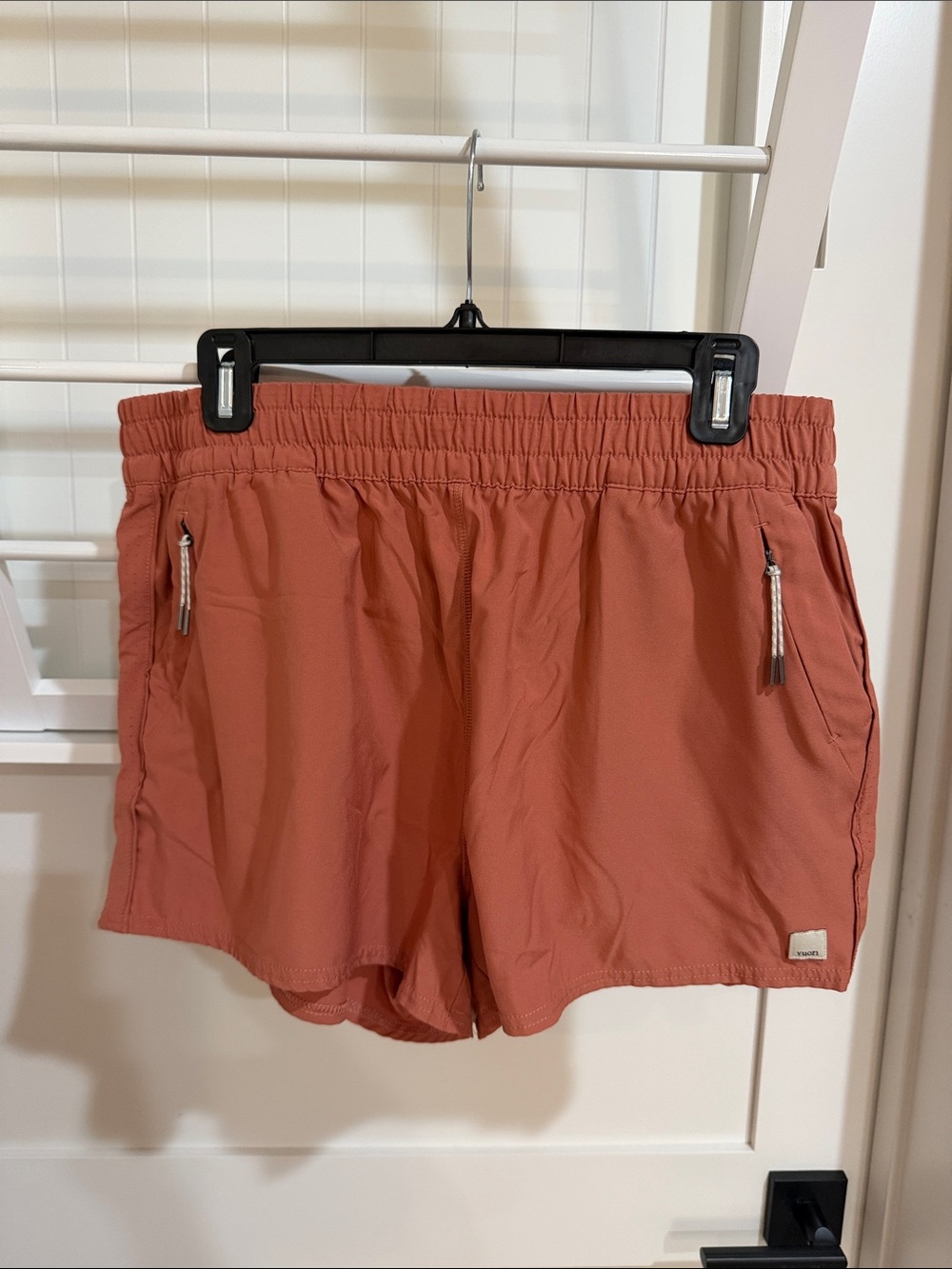 Vuori Women's Athletic Shorts in Terracotta Pink